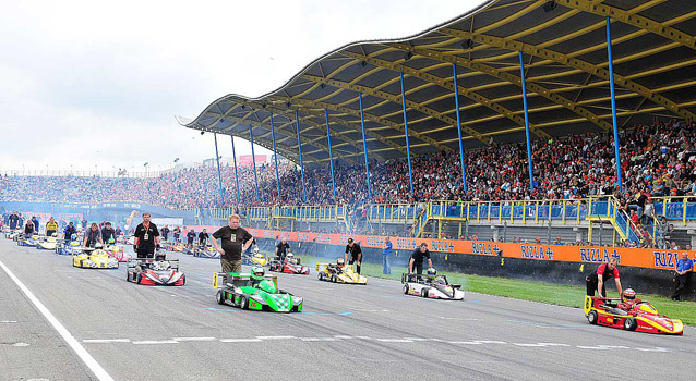 Superkarts in front of a big audience